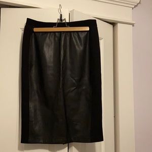 Black vegan leather pencil skirt with stretch side panels and waist